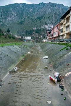 Polluted river from the mountains Stock Photos