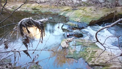 Polluted river with waste environmental damage concept 4K Stock Footage 330270313