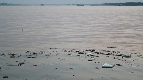 Polluted river water drifts through Samut Prakan Stock Footage 339874568