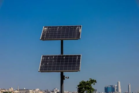 Polluted solar panel system on the road with blue sky Stock Photos
