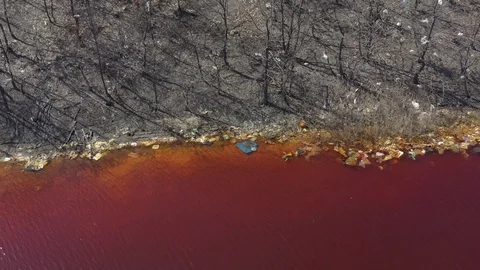 Polluted surface water with acid mine drainage AMD 4K drone video Stock Footage 110589037