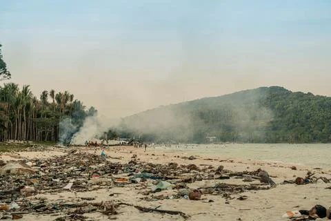 Polluted Tropical Sao Beach with Plastic Trash and Smoke in Phu Quoc Vietnam Stock-Fotos