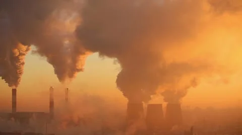 Polluting factory at dawn Stock Footage 14372586