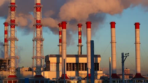 Polluting factory at dawn, time-lapse, beautiful fast moving smoke Stock Footage 34276080