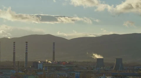 Polluting factory at dawn, time lapse. Stock Footage 61244259