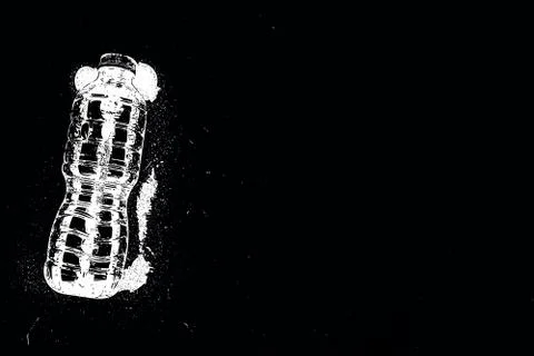 Polluting plastic bottle drawn on a black background Stock Photos