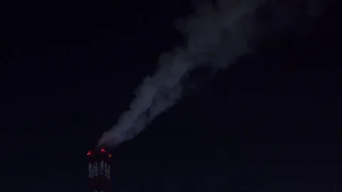 Polluting smoke stacks at night. 4K video Stock Footage 73077123