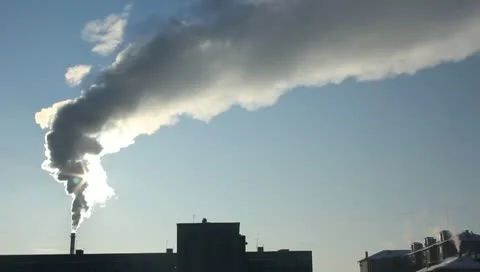 Polluting the thick smoke from the chimney closes sunlight Stock Footage 10719216