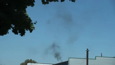 Pollution and bad air. Black smoke from the factory chimney Stock Footage 206476098