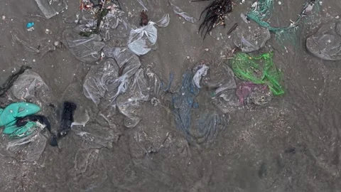 Pollution on the beach in Vietnam Stock Footage 296518030