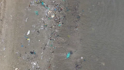 Pollution on the beach in Vietnam Stock Footage 296518227