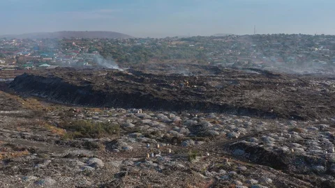 Pollution concept. Garbage pile in a trash dump in a Landfill, Zambia Lusaka Stock Footage 128071833