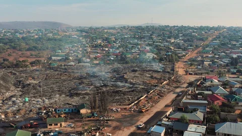 Pollution concept. Garbage pile in a trash dump in a Landfill, Zambia Lusaka Stock Footage 128072536