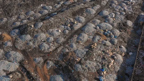 Pollution concept. Garbage pile in a trash dump in a Landfill, Zambia Lusaka Stock Footage 128072638