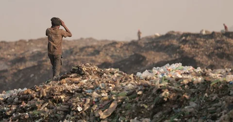 Pollution concept. Garbage pile in a trash dump in a Landfill, Zambia Lusaka Stock Footage 128194714