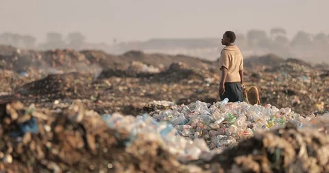 Pollution concept. Garbage pile in a trash dump in a Landfill, Zambia Lusaka Stock Footage 128194991