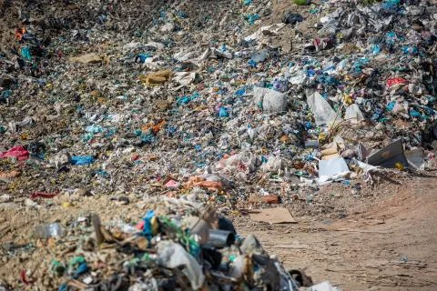Pollution concept garbage pile in trash, waste dump or a landfill, waste from Stock Photos