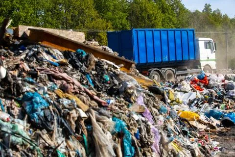 Pollution concept garbage pile in trash, waste dump or a landfill, waste from Stock Photos