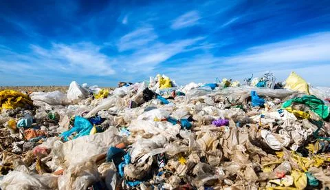 Pollution concept garbage pile in trash, waste dump or a landfill, waste from Stock Photos