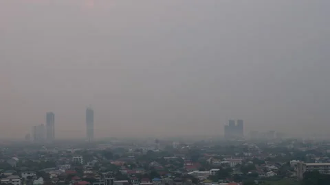 Pollution concept. Pm 2.5 or Particulate matters on the air in a city of Tha Stock Footage 139762386