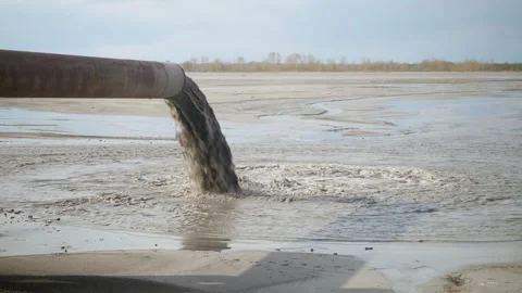 Pollution of the environment by industrial outfalls. Video stock 307276380