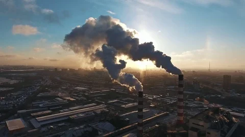 Pollution of the environment: a pipe with smoke. Aerial view Stock-Footage 82257357