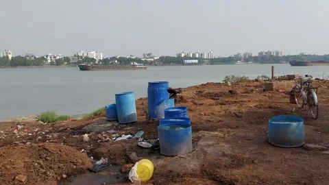 Pollution of the Ganges from  cow's  waste . Stock Footage 185532384