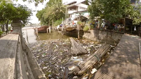 Pollution: garbage, plastic, and wastes in the Chao Phraya river, Thailand Stock Footage 68145318
