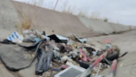 Pollution Grunge Trash Waste Garbage in Ditch Wash Environment California USA Video stock 155210102