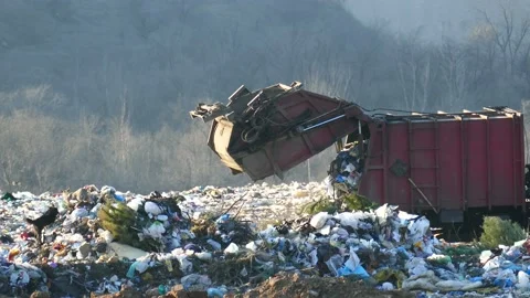 Pollution of nature concept. Landfill pattern. Garbage truck spills waste. Stock Footage 125329339