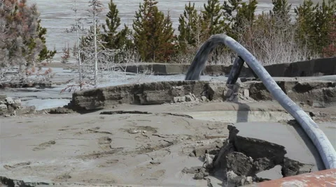 Pollution spews from pipe Stock Footage 4632986