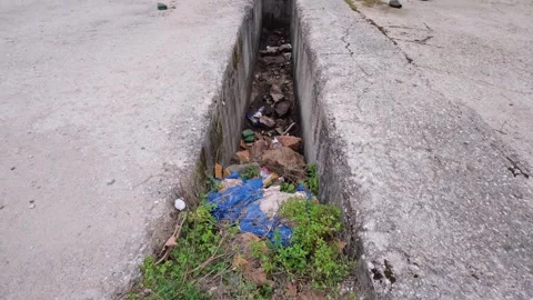 Pollution Through Discarded Waste and Plastic Litter in Nature Stock Footage 305234342