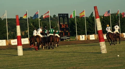 Polo challenge. Slight slow motion. N Jockeys chasing Stock Footage 64623698