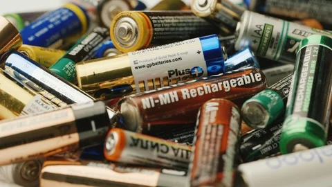 Poltava, Ukraine, DEC 2014: Many used batteries of different types. The Stock Footage 94149959