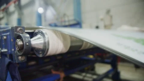 Polycarbonate sheet moves on conveyor belt at plant Stock Footage 228780543