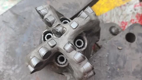 Polycrystalline Diamond Compact (PDC) drilling bit Video stock 323772208