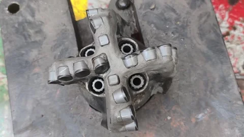 Polycrystalline Diamond Compact (PDC) drilling bit Video stock 324879314