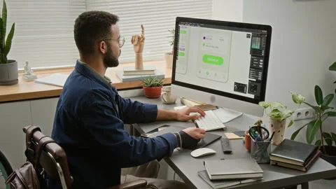 Polyethnic Male User Interface Designer Drawing Wireframes on Graphic Tablet Stock Footage 327906068