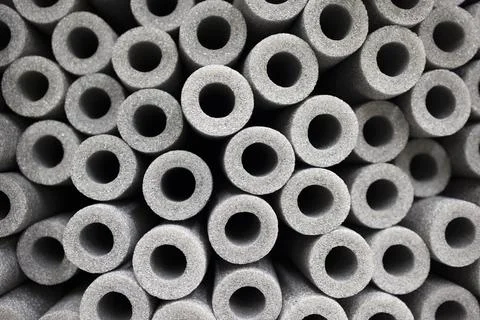 Polyethylene foam pipe insulation background texture. soft focus Stock Photos