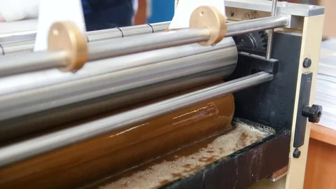 Polygraph machine - Industrial glue on printing industry Stock Footage 76934670