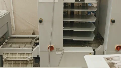 Polygraph process inside - folding machine on printing industry, slider Stock Footage 69126649