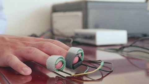 Polygraph sensors on human fingers Stock Footage 158987920