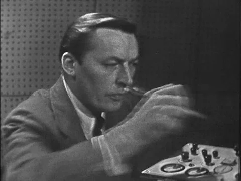 A polygraph technician performs a playing card during the polygraph of a Stock Footage 75297332