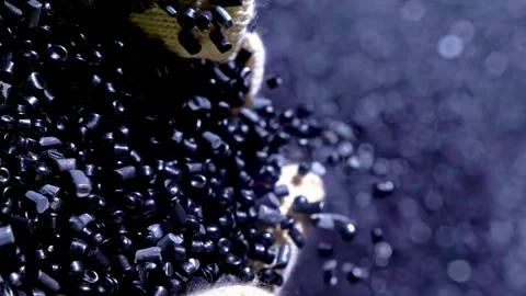 Polymer composite raw material pours in container for mixing.Concept ecological Stock Footage 327535429