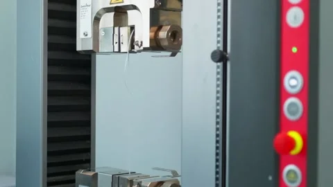 Polymer thread for plastic sack bags is tested for strength in laboratory Stock Footage 202076076