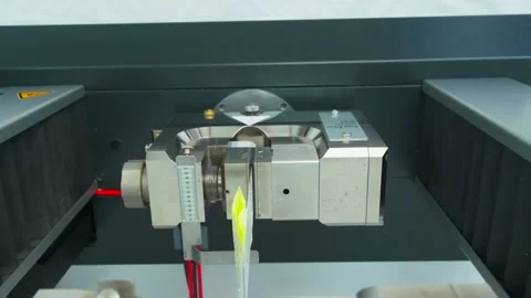 Polymer thread sample tape is tested for strength Stock Footage 202056552