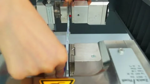 Polymer thread sample tape is tested for strength in slow motion Stock Footage 202057668
