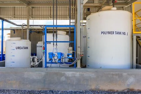 Polymer treatment tank, Waste processing facility exterior Stock Photos