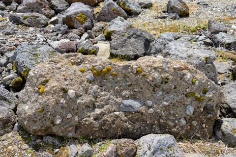 Polymictic conglomerate of volcanic origin Stock Photos