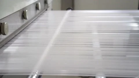 The polypropylene extruder with a flat slit nozzle is heated to 260 C. Fabric 動画素材 164814941